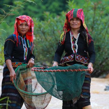 Woman in vietnam fishing
